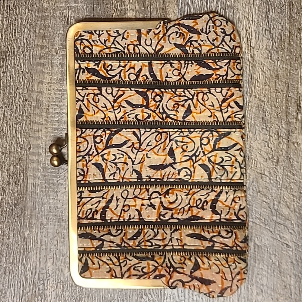 World Finds Kiss Lock Clutch